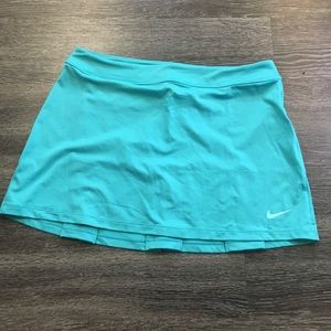 Teal Nike tennis/golf skirt. No undershorts!!